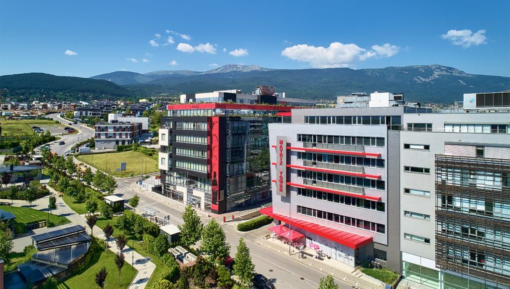 Matrix Tower aerial view of building, surrounding office buildings and front street