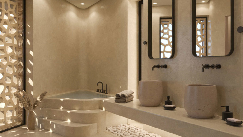 Petrothalassa Villas cozy bathroom interior with a tub, sinks and mirrors